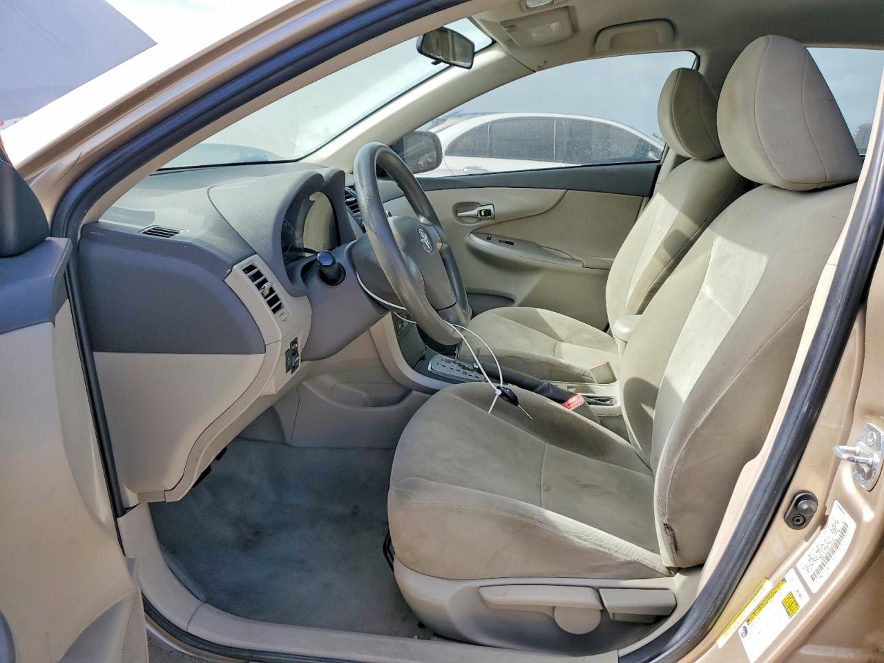 2010 Toyota Corolla Le Gold vin: 1NXBU4EE6AZ284006