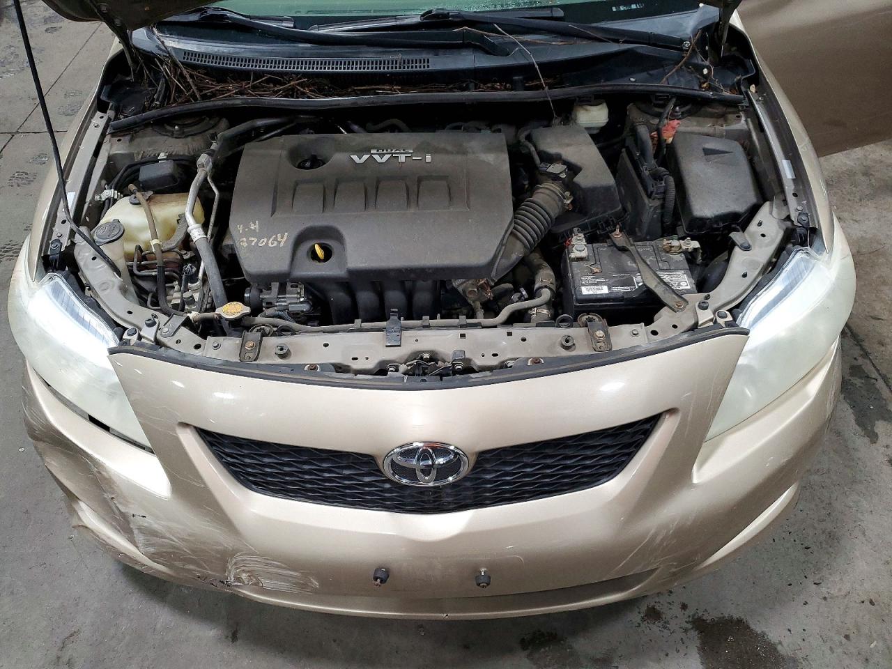 2010 Toyota Corolla Le Tan vin: 1NXBU4EE6AZ304139