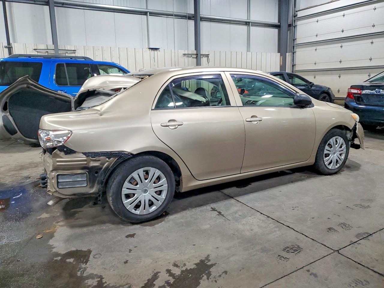 2010 Toyota Corolla Le Tan vin: 1NXBU4EE6AZ304139