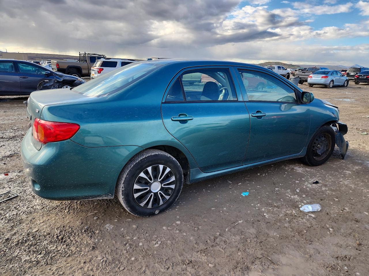 2010 Toyota Corolla Le Teal vin: 1NXBU4EE6AZ306263