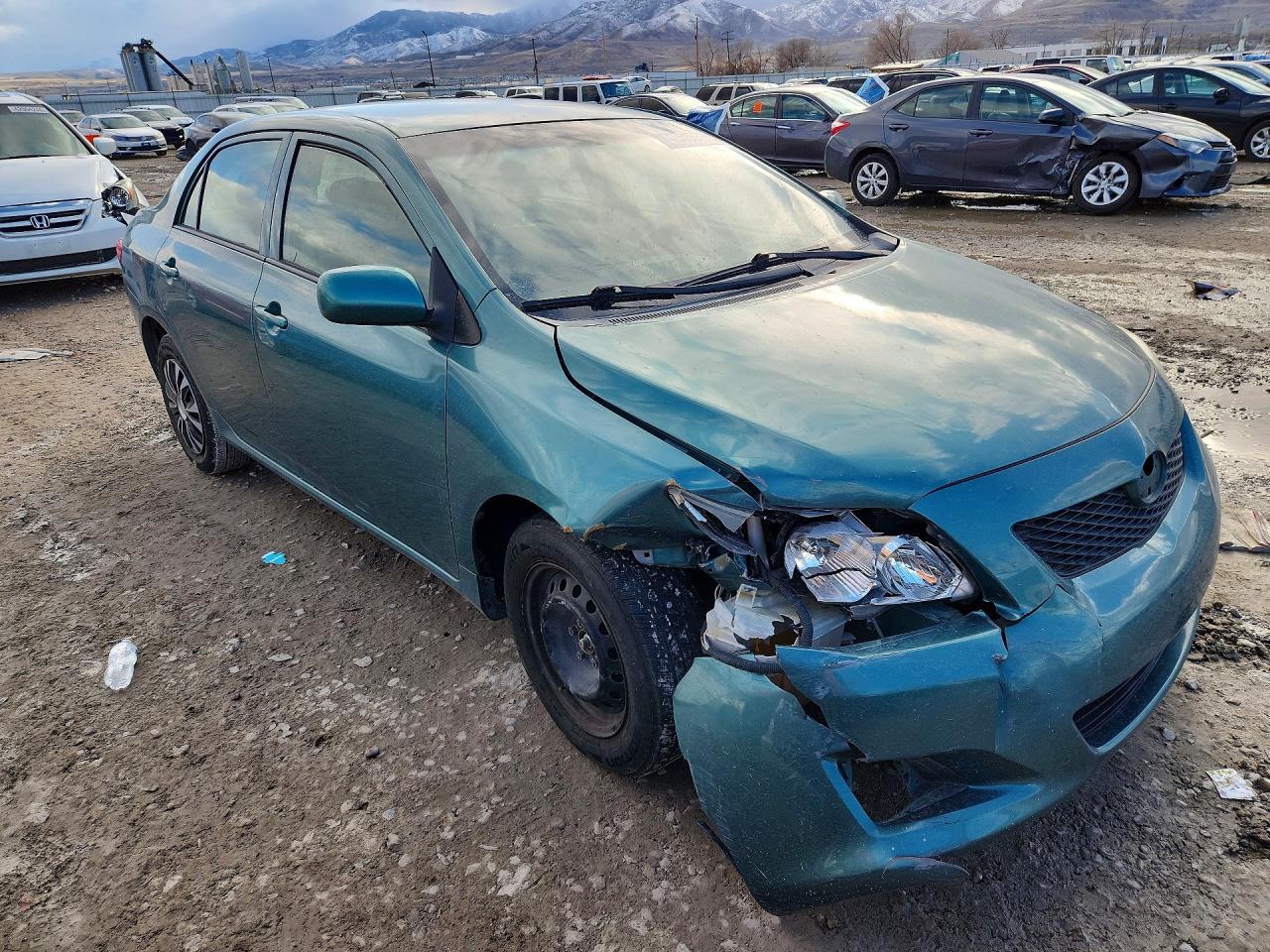2010 Toyota Corolla Le Teal vin: 1NXBU4EE6AZ306263