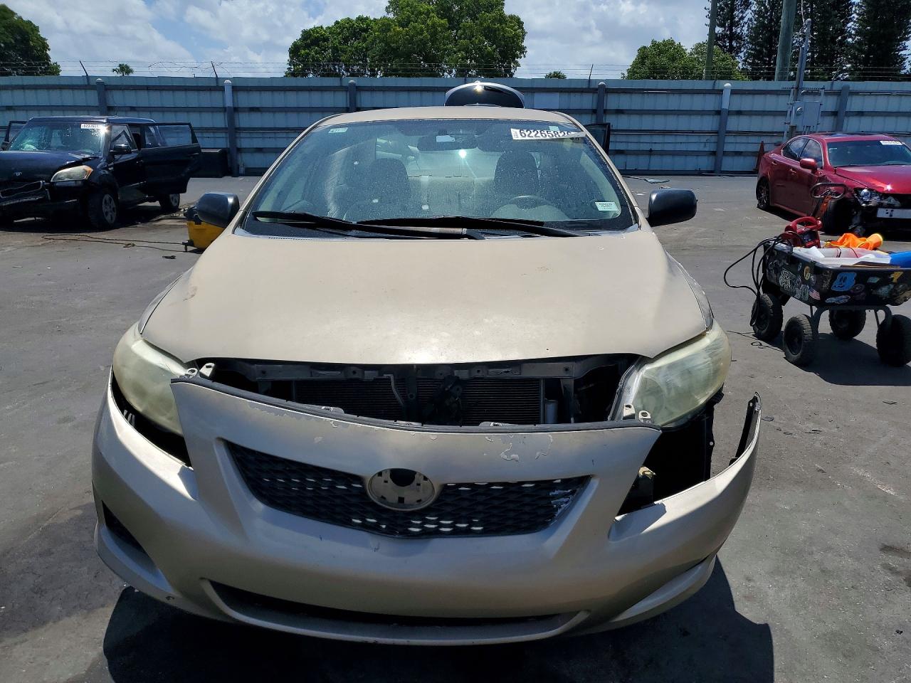 2010 Toyota Corolla Base Бежевый vin: 1NXBU4EE6AZ310569