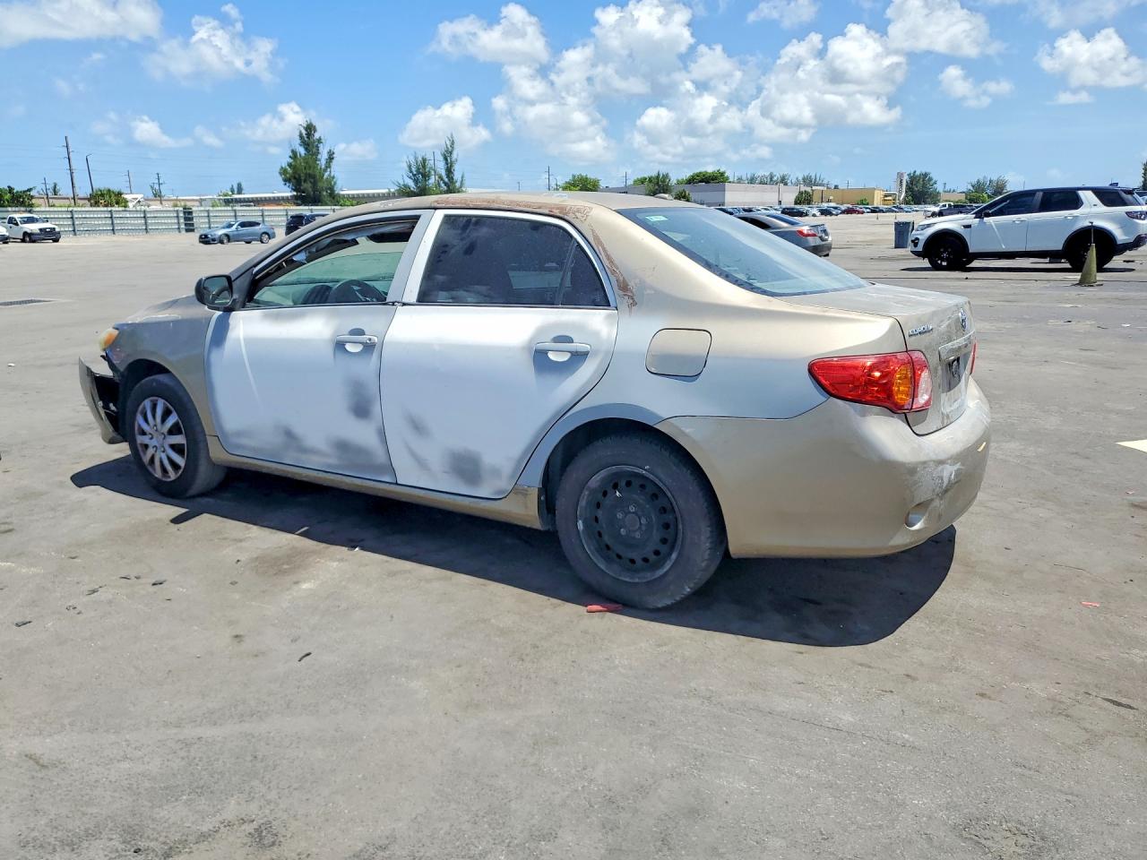 2010 Toyota Corolla Base Бежевый vin: 1NXBU4EE6AZ310569