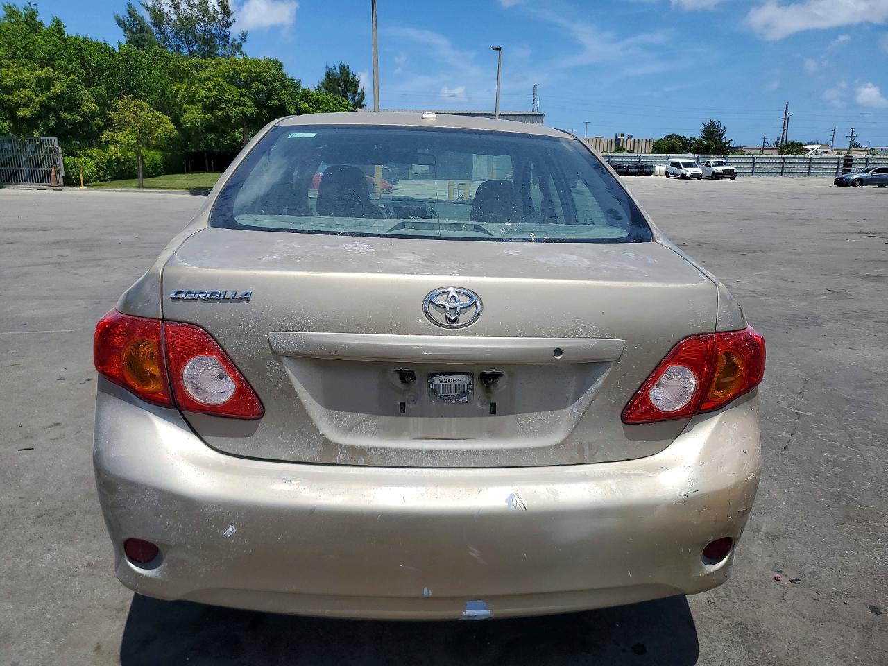 2010 Toyota Corolla Base Бежевый vin: 1NXBU4EE6AZ310569