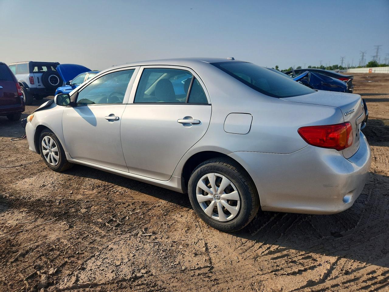 2010 Toyota Corolla Le Silver vin: 1NXBU4EE6AZ318932