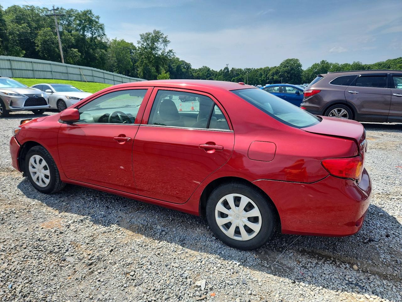 2010 Toyota Corolla Le Red vin: 1NXBU4EE6AZ354538