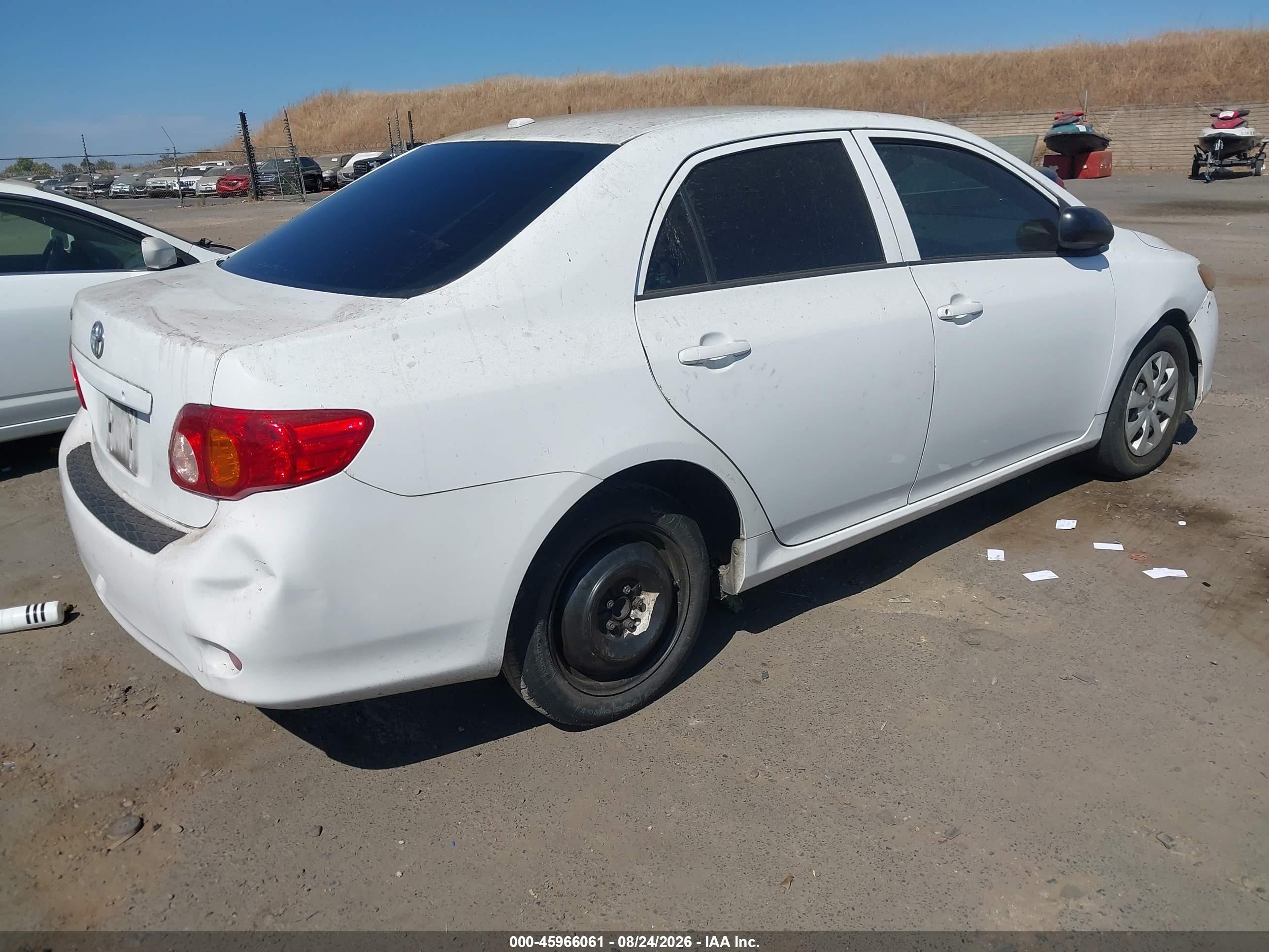 2010 Toyota Corolla   White vin: 1NXBU4EE7AZ209427