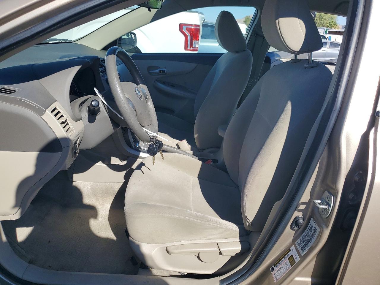2010 Toyota Corolla Le Gold vin: 1NXBU4EE7AZ237793