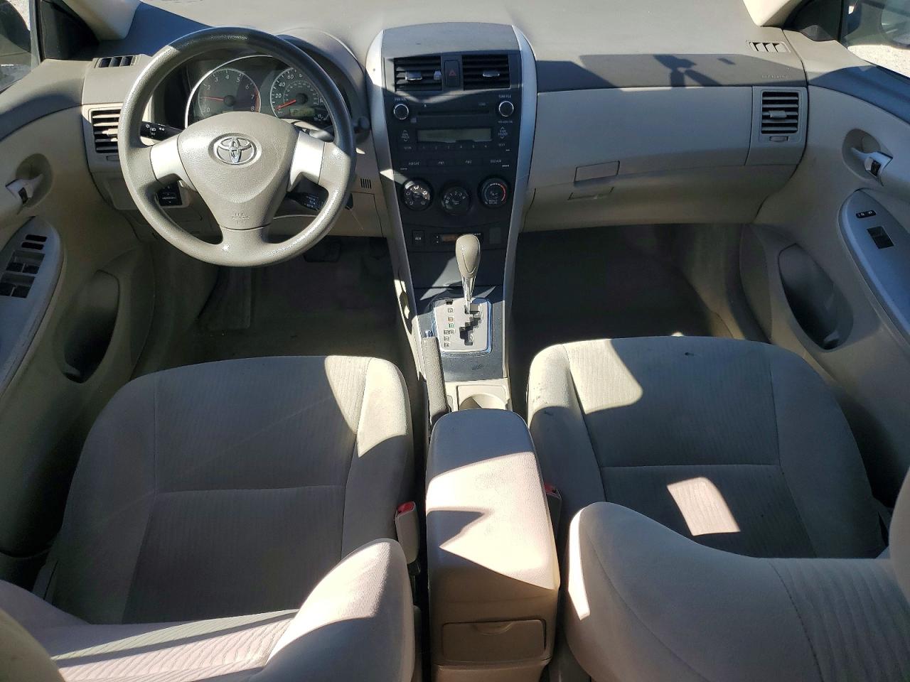 2010 Toyota Corolla Le Gold vin: 1NXBU4EE7AZ237793