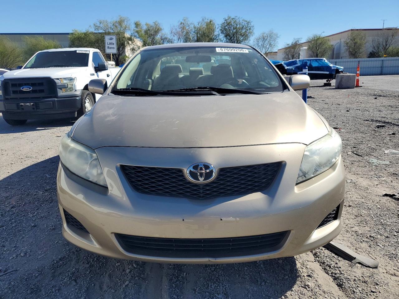 2010 Toyota Corolla Le Gold vin: 1NXBU4EE7AZ237793