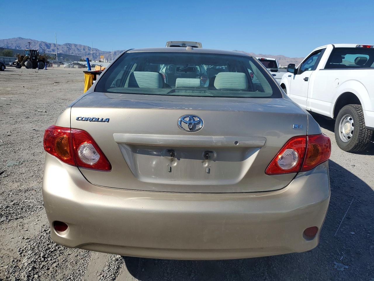 2010 Toyota Corolla Le Gold vin: 1NXBU4EE7AZ237793