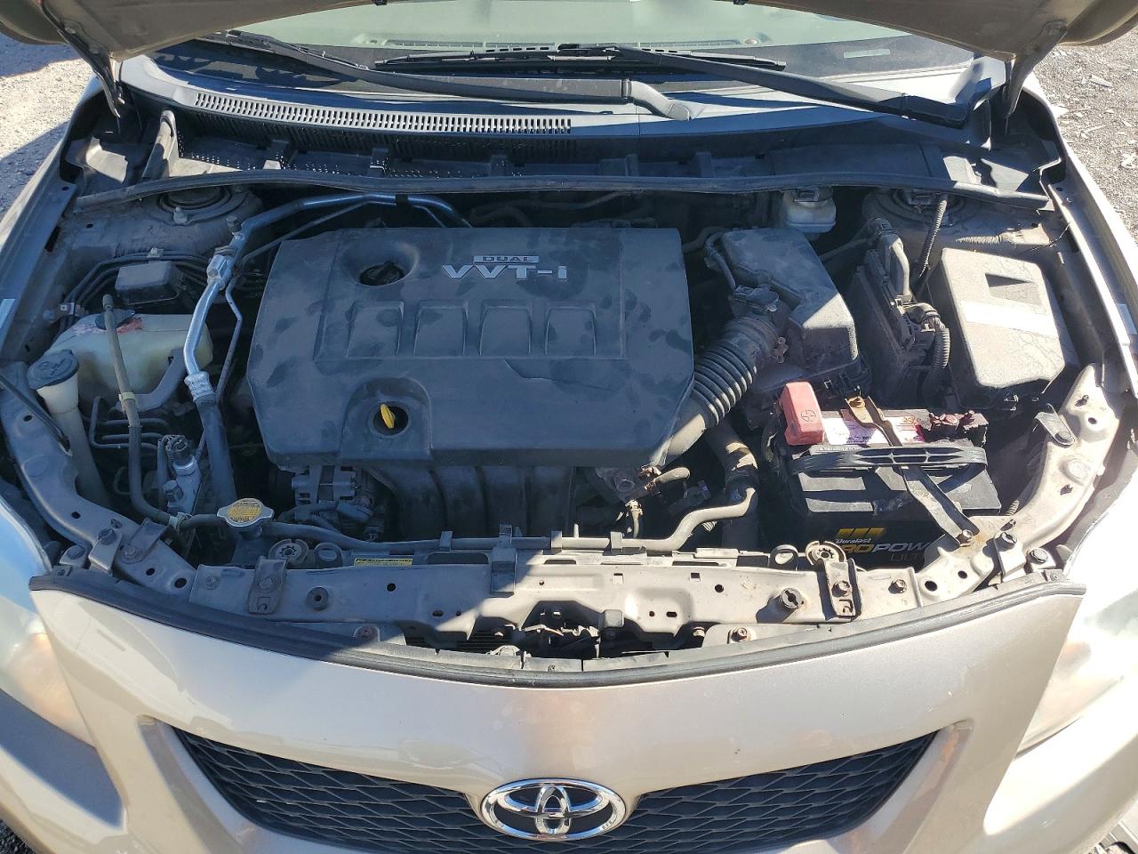 2010 Toyota Corolla Le Gold vin: 1NXBU4EE7AZ237793