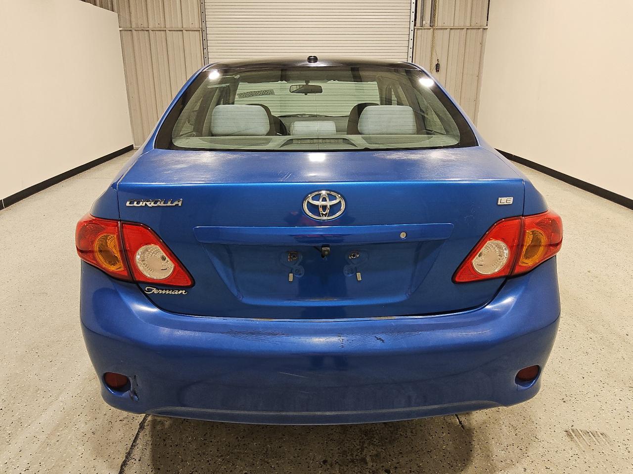 2010 Toyota Corolla Le Blue vin: 1NXBU4EE7AZ272785 Damage: Rear Bumper, Previous Repair, Substandard Repair