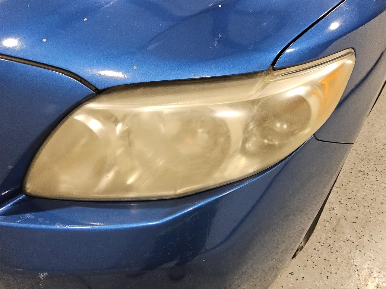 2010 Toyota Corolla Le Blue vin: 1NXBU4EE7AZ272785 Damage: Left Head Lamp, Faded, Acceptable