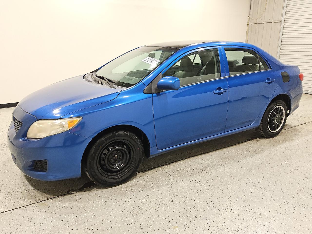 2010 Toyota Corolla Le Blue vin: 1NXBU4EE7AZ272785 Damage: Left Front Wheel Cover, Missing, Replacement Required