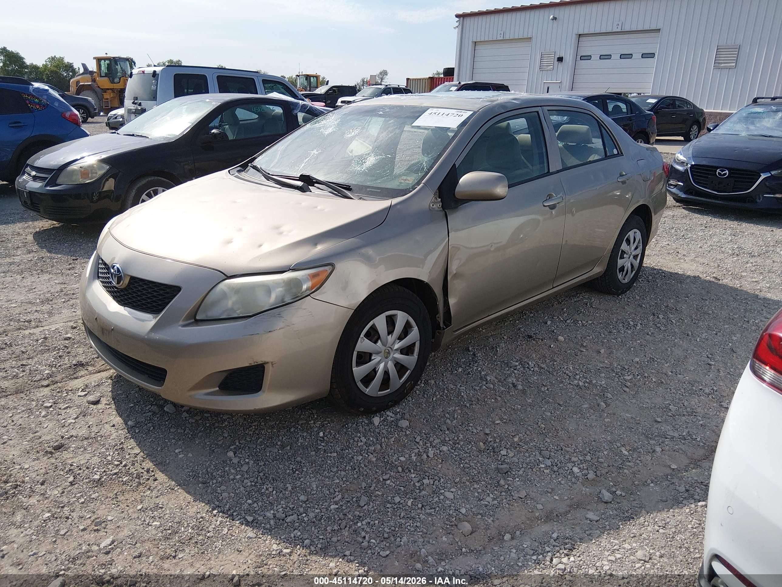 2010 Toyota Corolla Le Gold vin: 1NXBU4EE7AZ296732