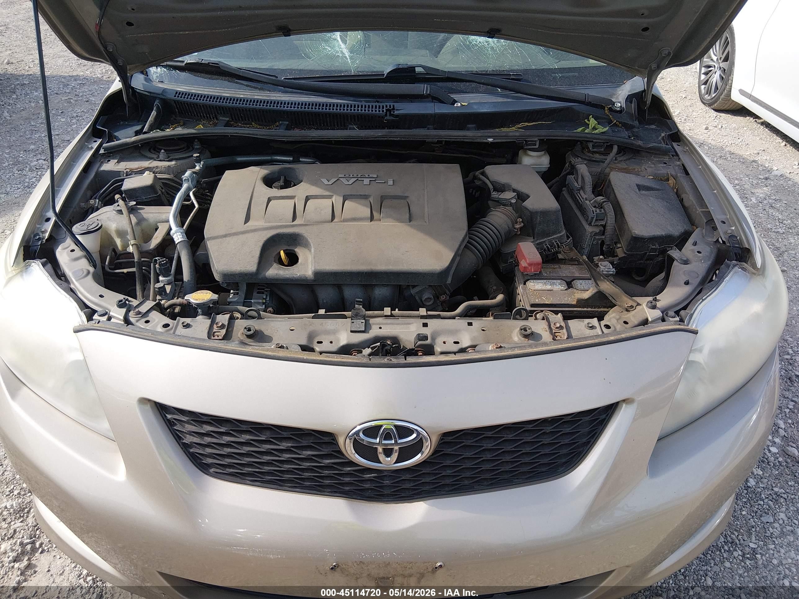 2010 Toyota Corolla Le Gold vin: 1NXBU4EE7AZ296732