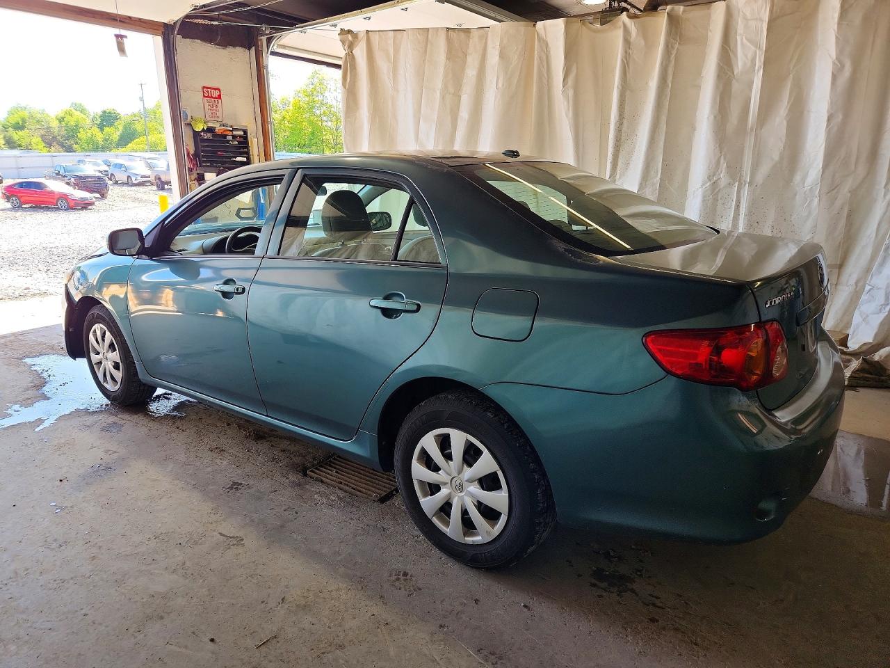 2010 Toyota Corolla Le Teal vin: 1NXBU4EE7AZ336159