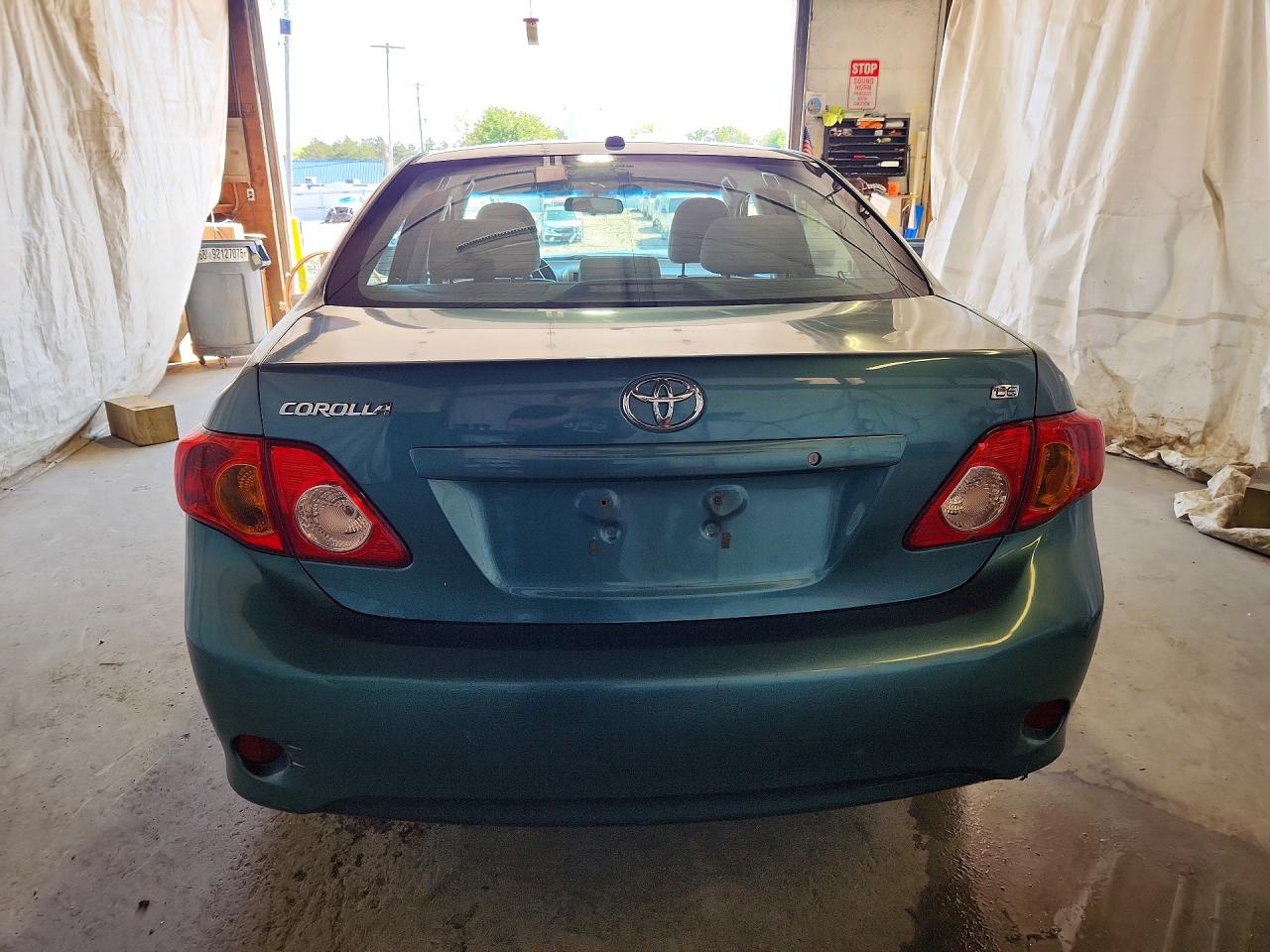 2010 Toyota Corolla Le Teal vin: 1NXBU4EE7AZ336159