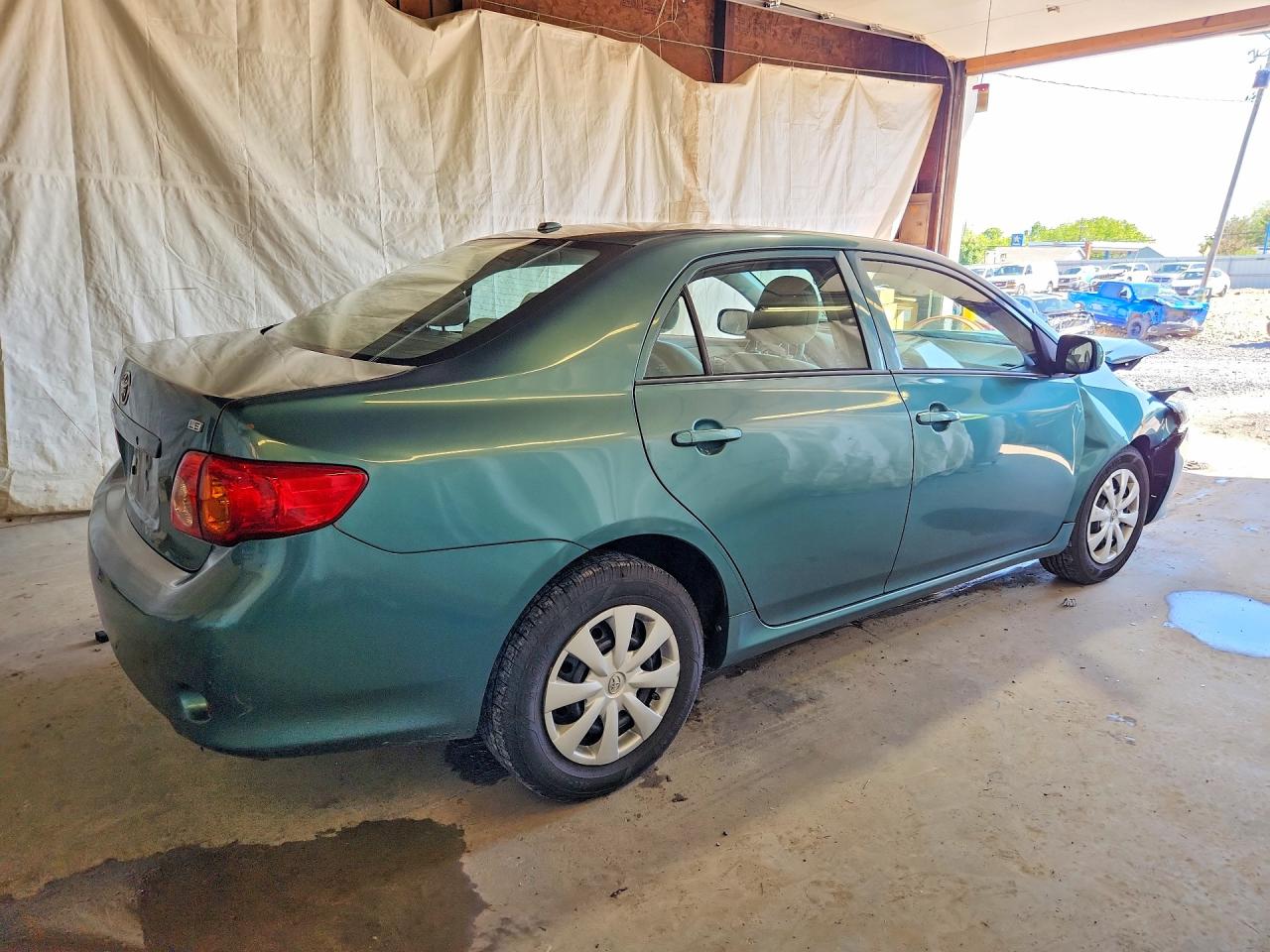 2010 Toyota Corolla Le Teal vin: 1NXBU4EE7AZ336159