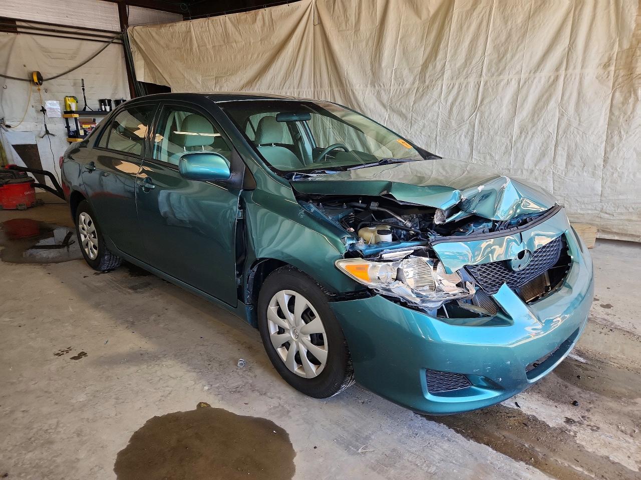 2010 Toyota Corolla Le Teal vin: 1NXBU4EE7AZ336159