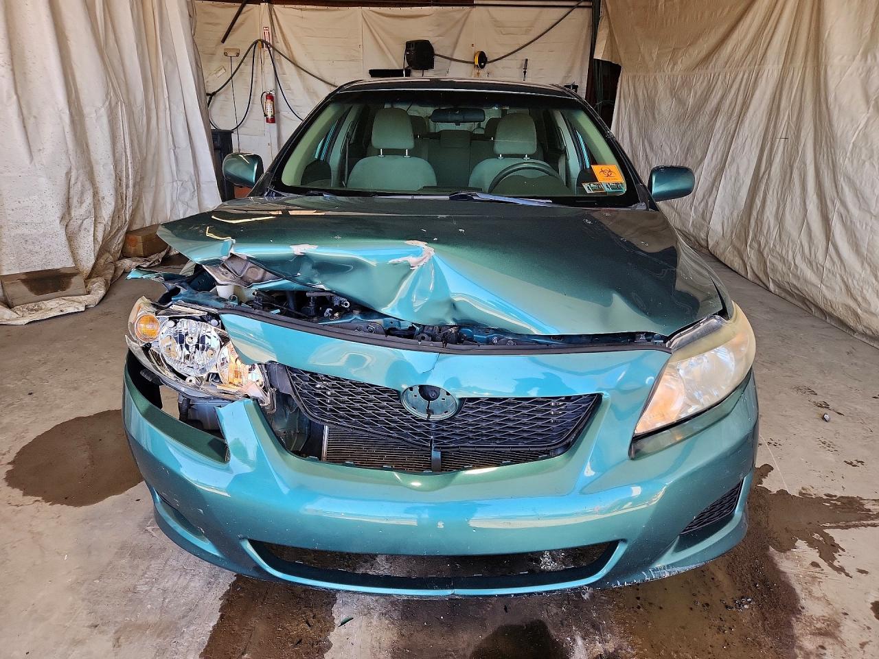 2010 Toyota Corolla Le Teal vin: 1NXBU4EE7AZ336159