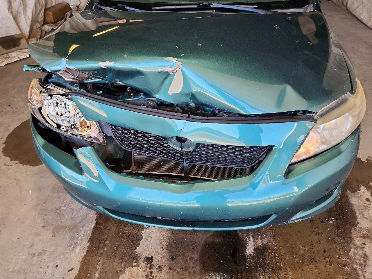 2010 Toyota Corolla Le Teal vin: 1NXBU4EE7AZ336159