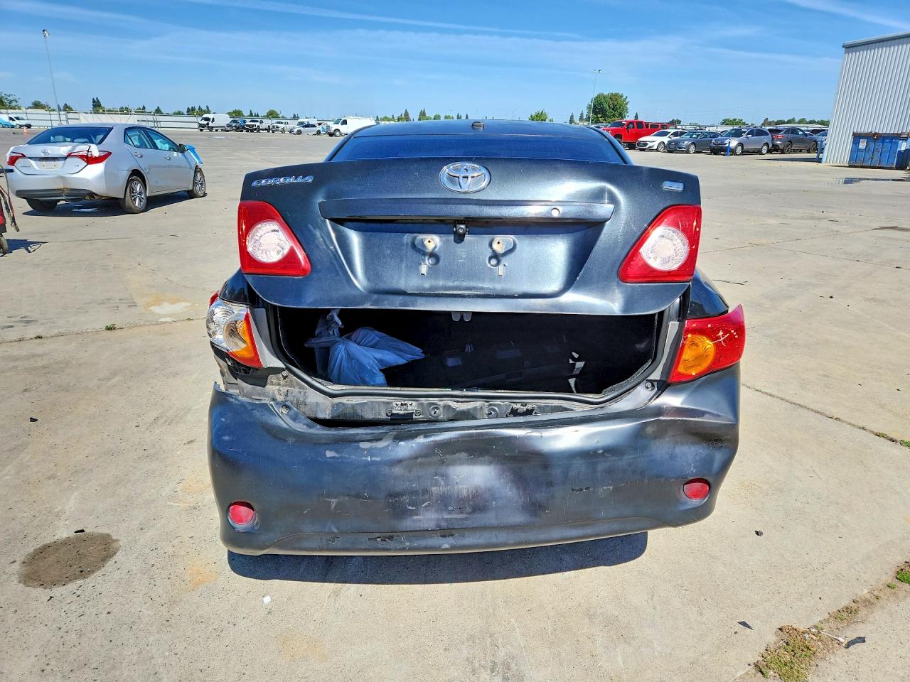 2010 Toyota Corolla Le Black vin: 1NXBU4EE8AZ182433