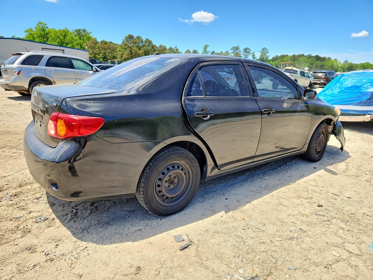 2010 Toyota Corolla Le Black vin: 1NXBU4EE8AZ208755