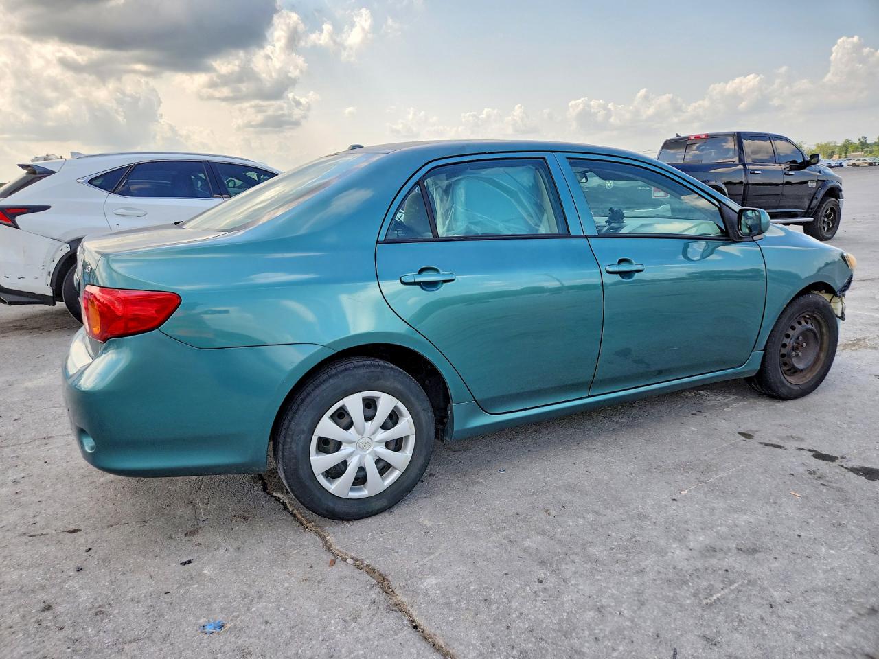 2010 Toyota Corolla Le Turquoise vin: 1NXBU4EE8AZ242789