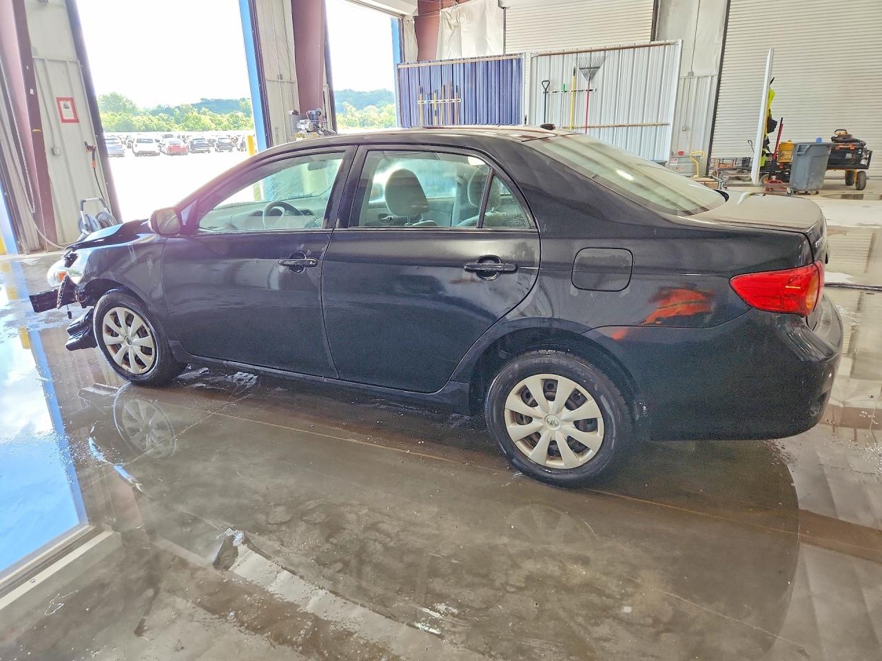 2010 Toyota Corolla Le Black vin: 1NXBU4EE8AZ250438