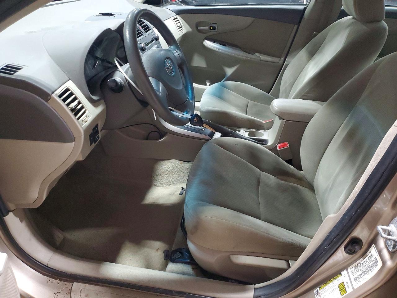2010 Toyota Corolla Le Tan vin: 1NXBU4EE8AZ259219