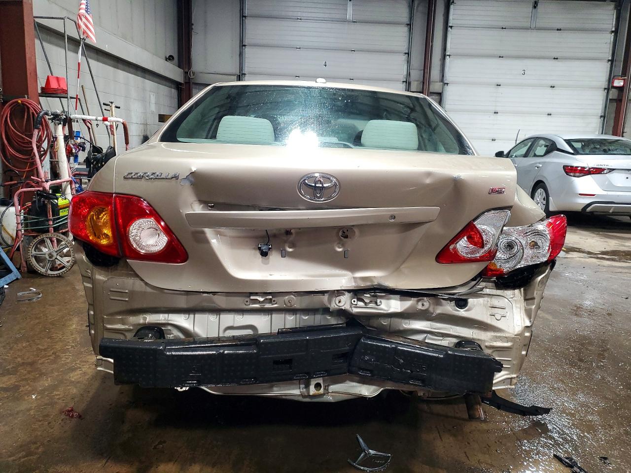 2010 Toyota Corolla Le Tan vin: 1NXBU4EE8AZ259219