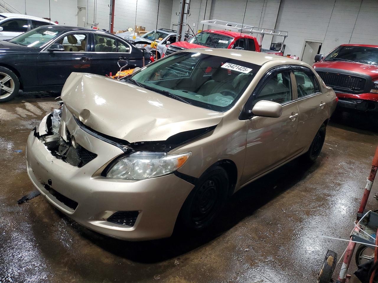 2010 Toyota Corolla Le Tan vin: 1NXBU4EE8AZ259219