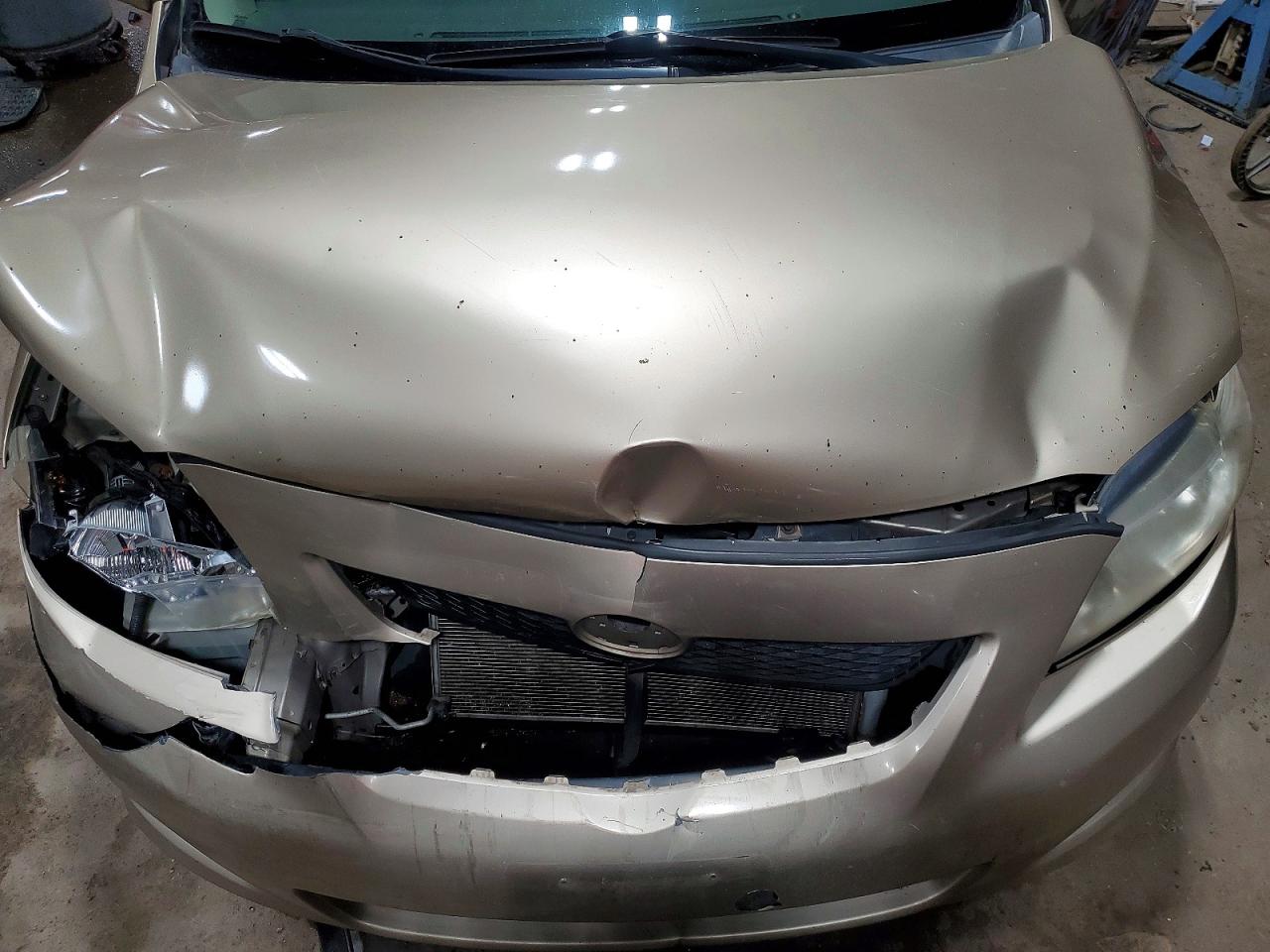 2010 Toyota Corolla Le Tan vin: 1NXBU4EE8AZ259219