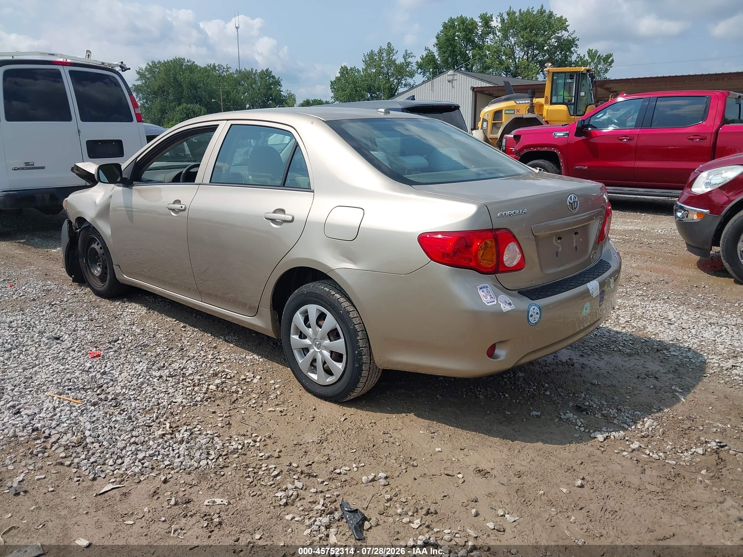 2010 Toyota Corolla Le Tan vin: 1NXBU4EE8AZ316065
