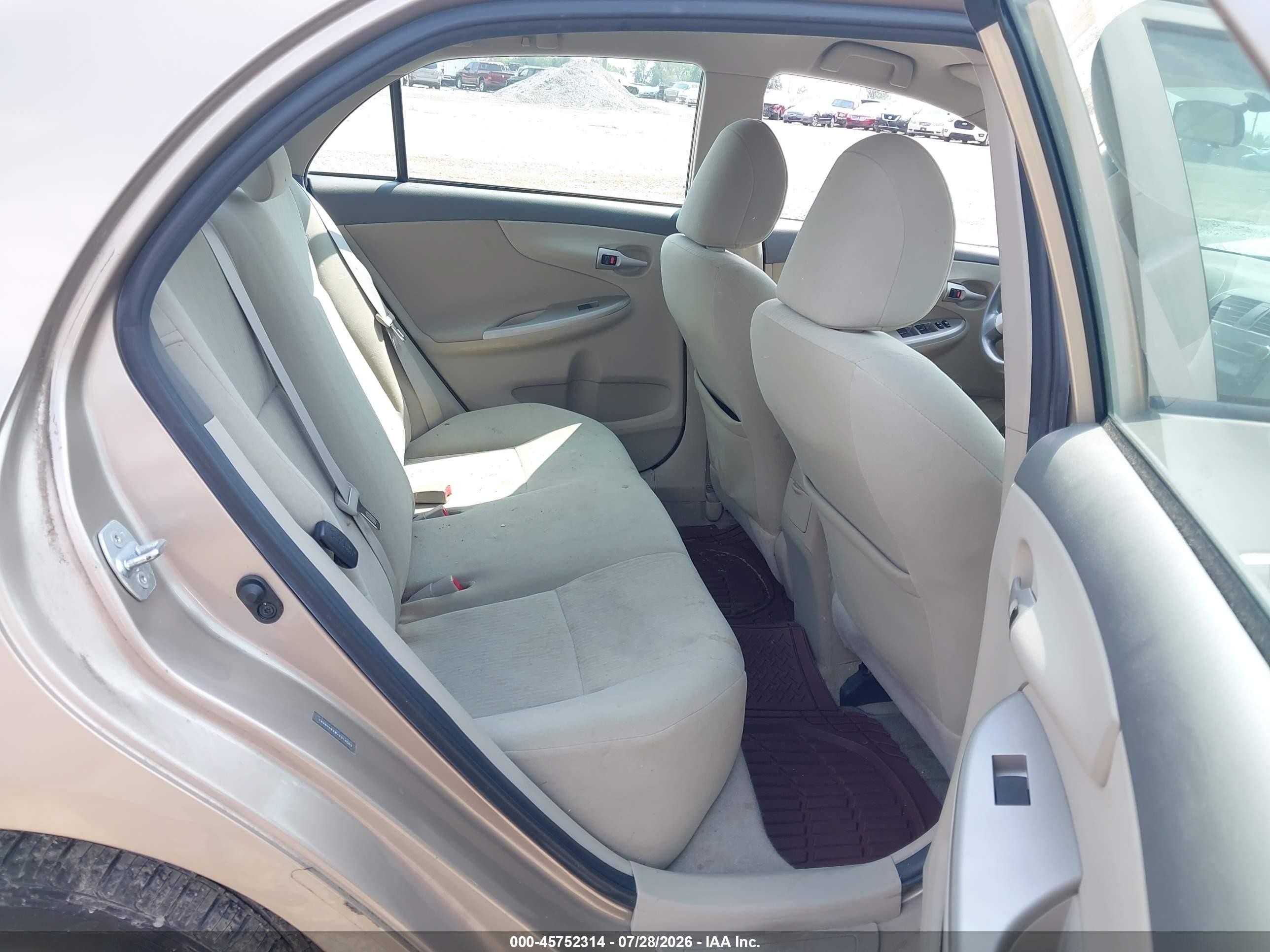 2010 Toyota Corolla Le Tan vin: 1NXBU4EE8AZ316065
