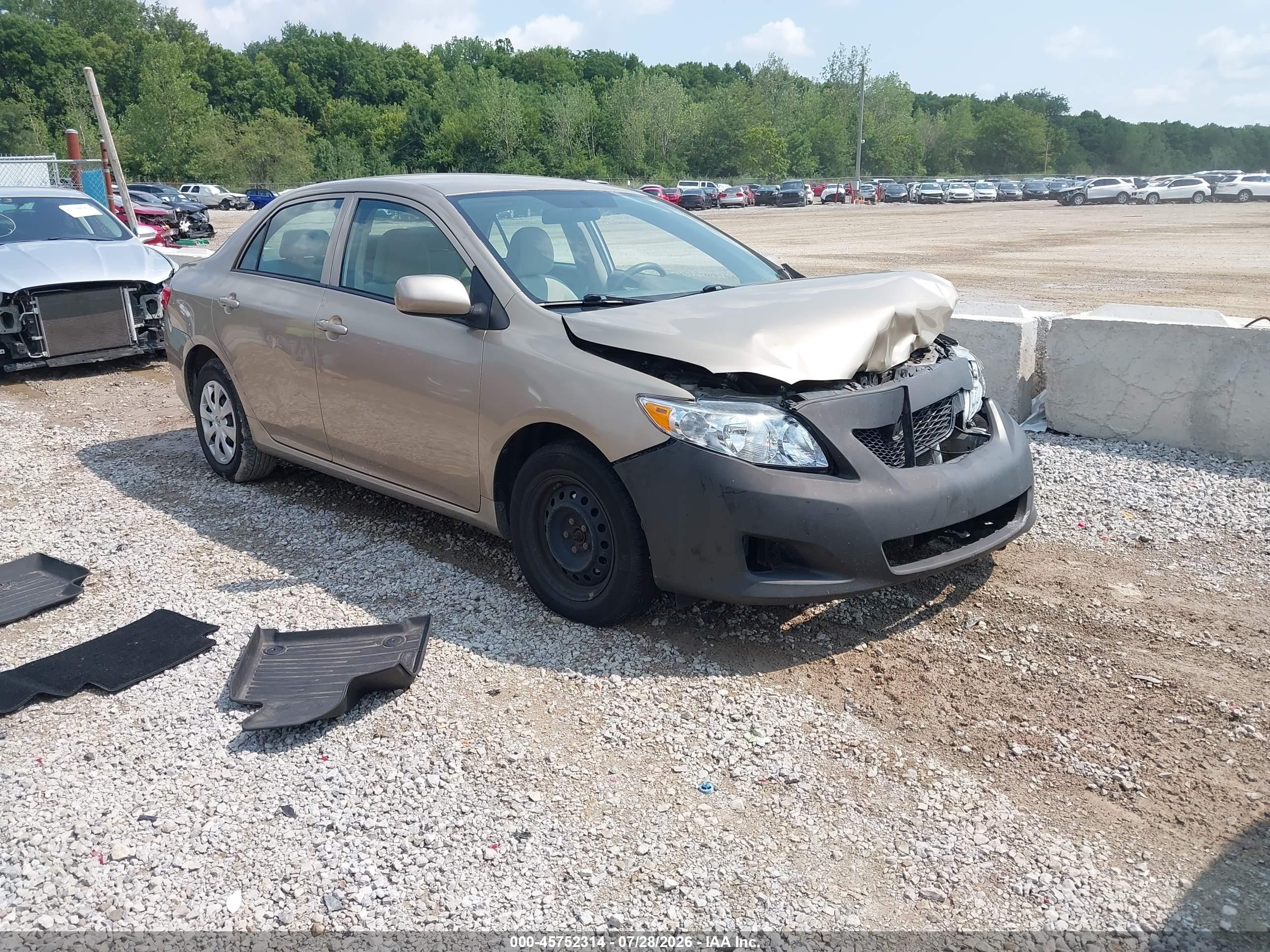 2010 Toyota Corolla Le Tan vin: 1NXBU4EE8AZ316065