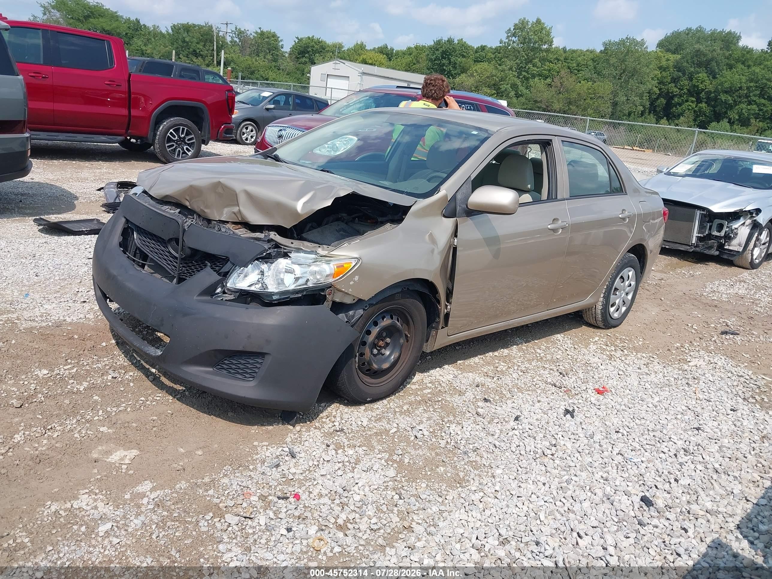 2010 Toyota Corolla Le Tan vin: 1NXBU4EE8AZ316065