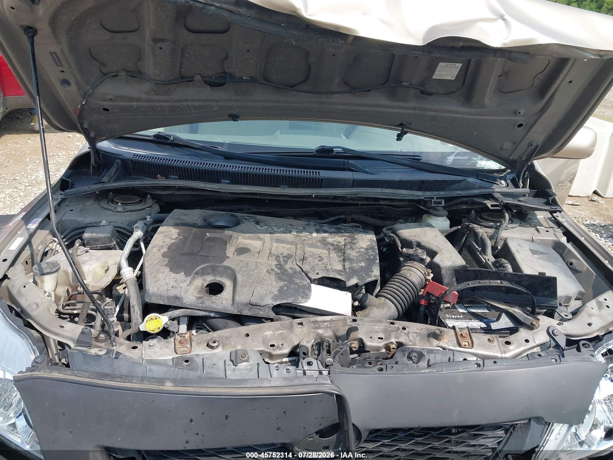 2010 Toyota Corolla Le Tan vin: 1NXBU4EE8AZ316065