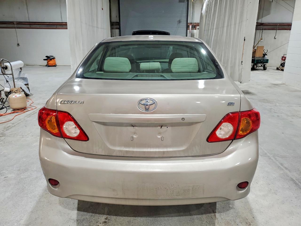 2010 Toyota Corolla Le Tan vin: 1NXBU4EE8AZ330547
