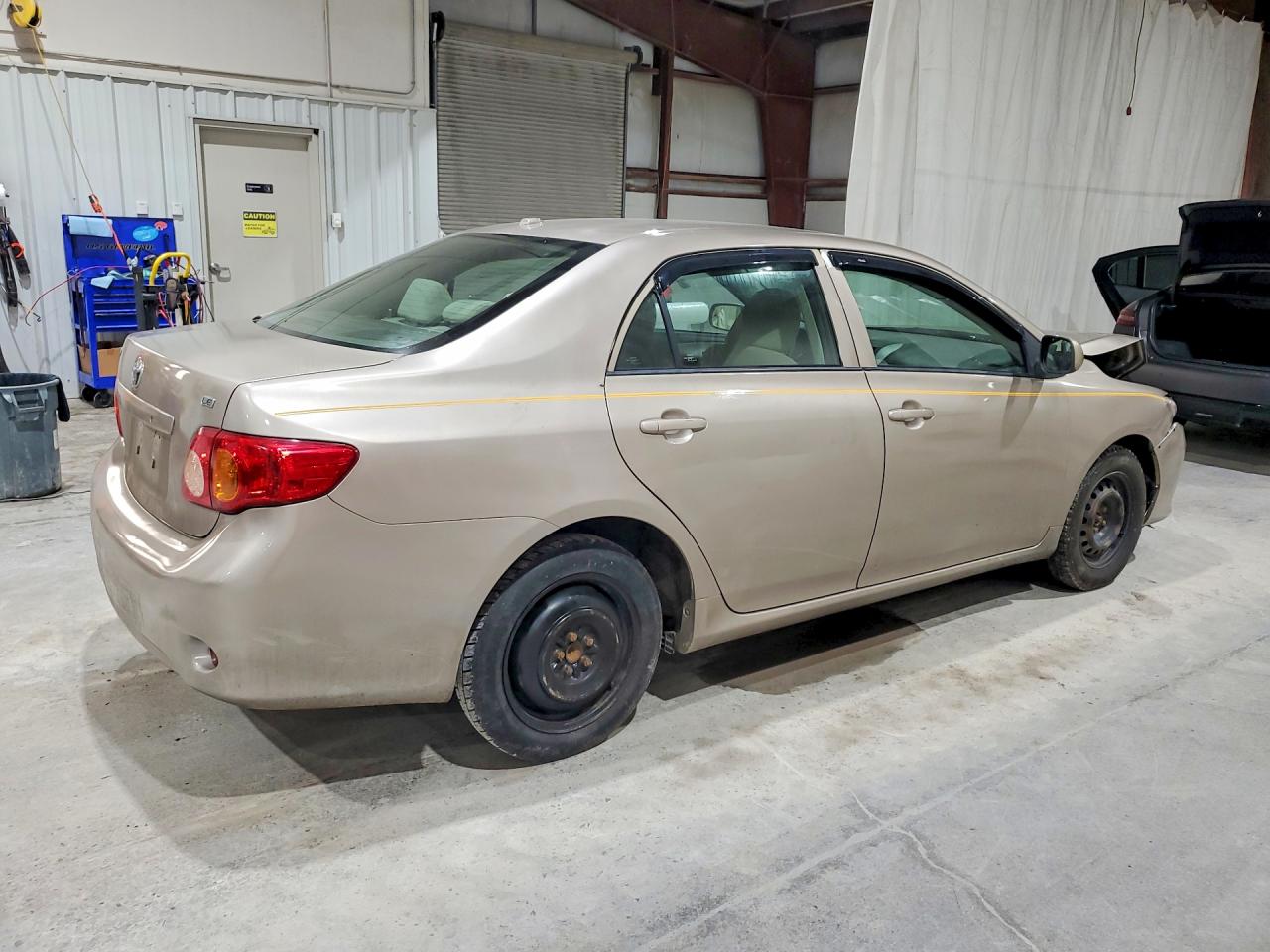 2010 Toyota Corolla Le Tan vin: 1NXBU4EE8AZ330547