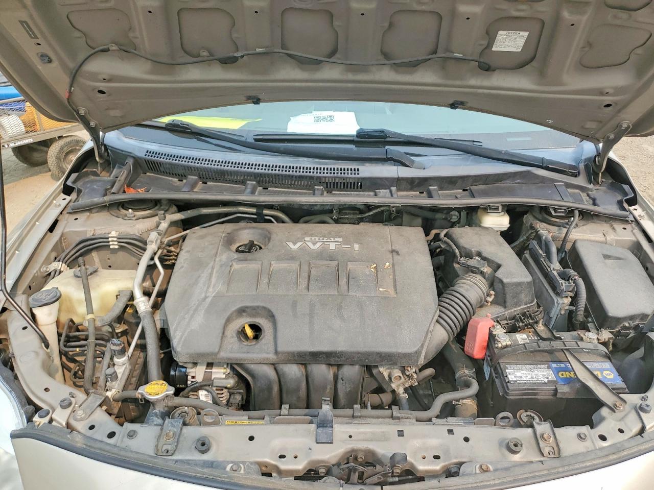 2010 Toyota Corolla Le Gold vin: 1NXBU4EE8AZ333951