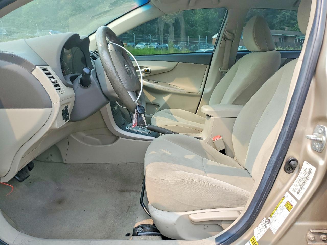 2010 Toyota Corolla Le Gold vin: 1NXBU4EE8AZ333951