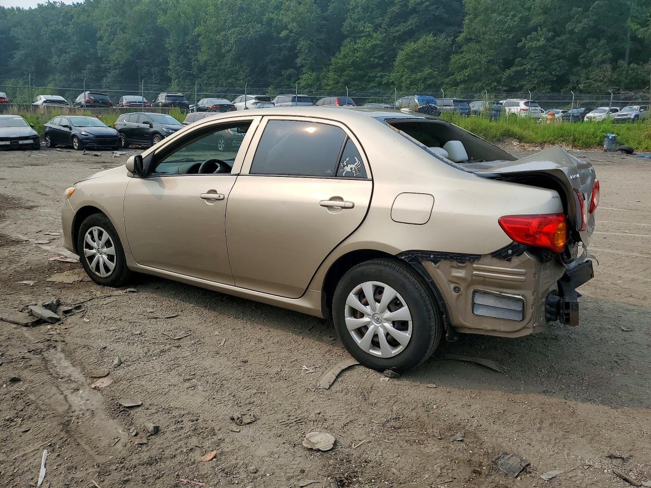 2010 Toyota Corolla Le Gold vin: 1NXBU4EE8AZ333951