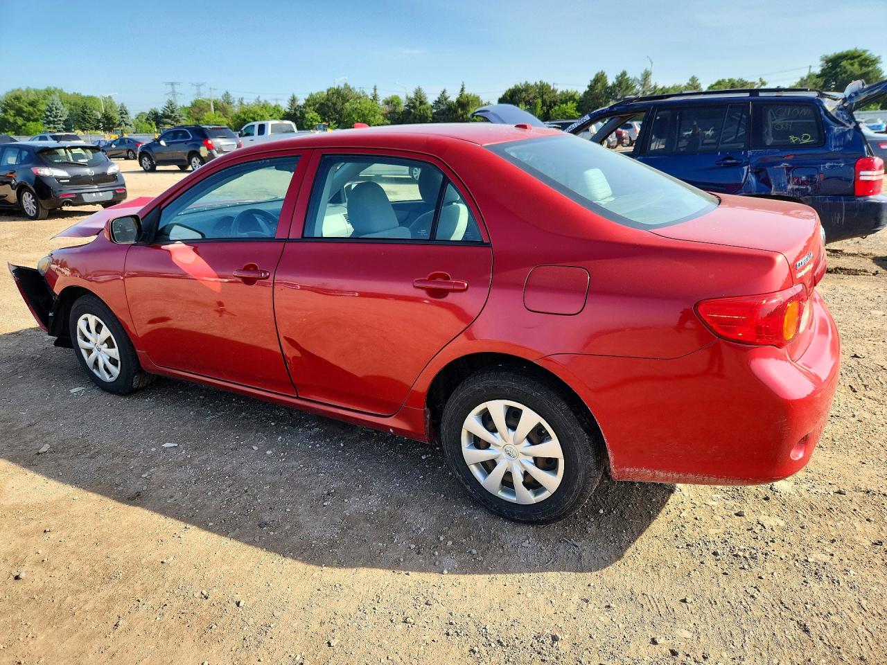 2010 Toyota Corolla Le Red vin: 1NXBU4EE8AZ356114