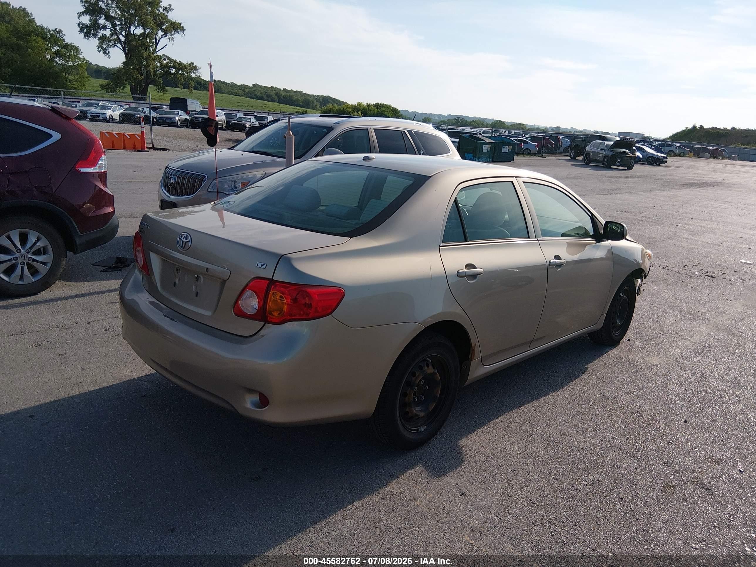 2010 Toyota Corolla Le Gold vin: 1NXBU4EE9AZ176382