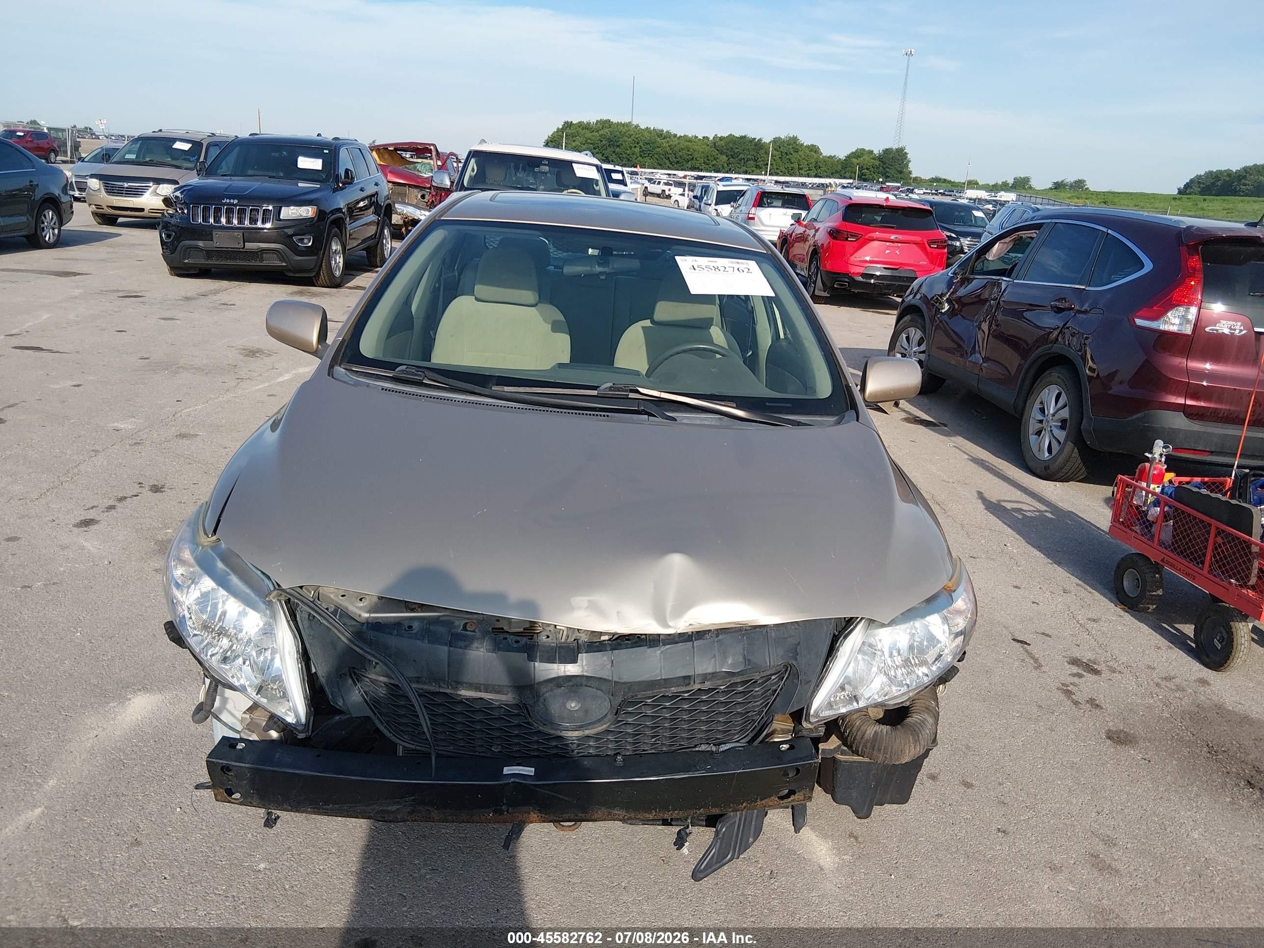 2010 Toyota Corolla Le Gold vin: 1NXBU4EE9AZ176382