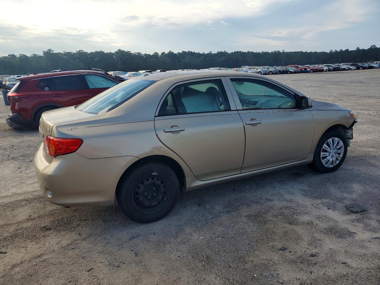 2010 Toyota Corolla Le Gold vin: 1NXBU4EE9AZ191934