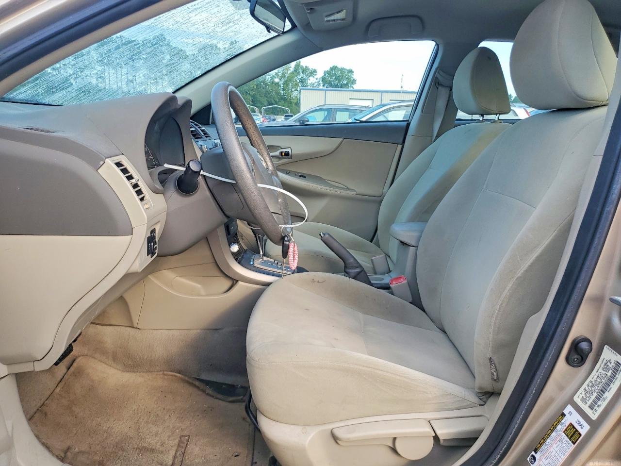 2010 Toyota Corolla Le Gold vin: 1NXBU4EE9AZ191934